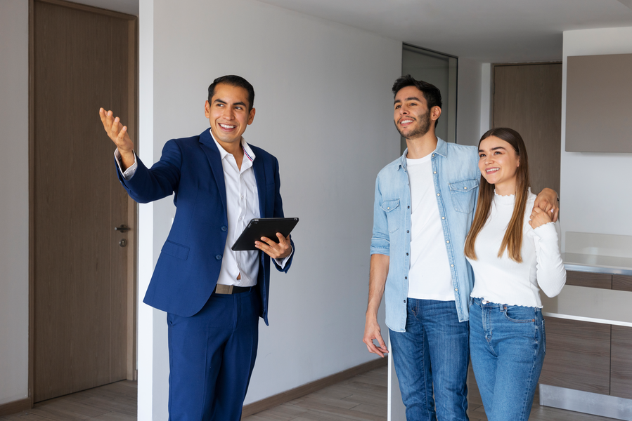 Realtor using open house automation on a tablet with digital sign-in shee