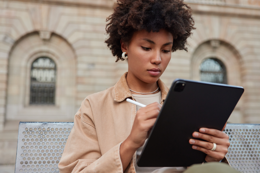 Realtor using digital sign-in at an open house to capture leads in 2025